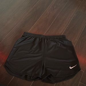 black nike shorts. too big for me